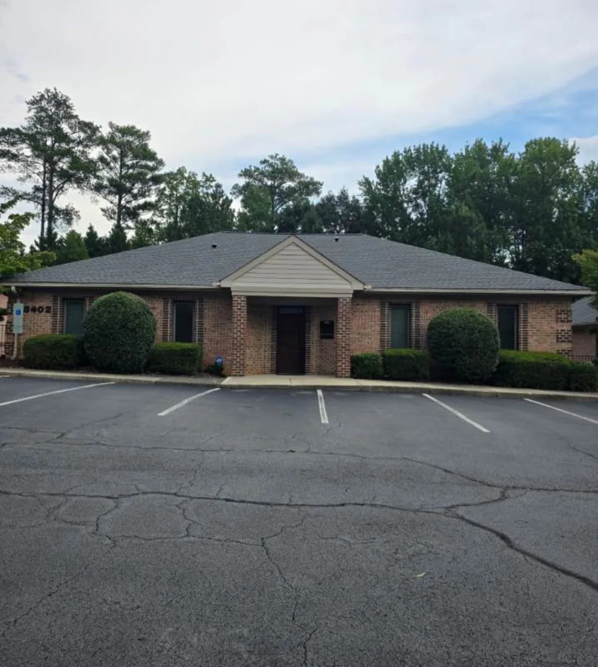 Exterior of the shared Raleigh facility at 8402 Six Forks Road
